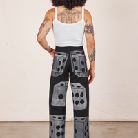 Back view of Icon Work Pants in Dice and vintage off-white Cropped Cami worn by Jesse