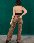 Back view of Leopard Work Pants and black Halter Top on Tiara