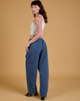 Baggy Mid-Rise Trousers in French Blue angled back view on Alex