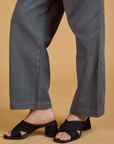 Baggy Mid-Rise Trousers in Slate Grey pant leg side view close up on Alex