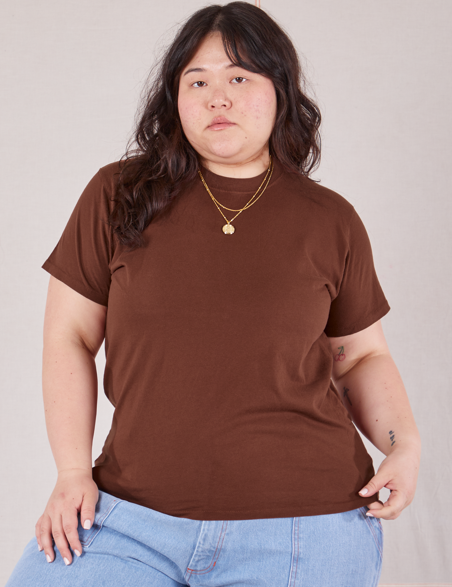 Ashley is wearing Organic Vintage Tee in Fudgesicle Brown