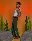 Side view of Paintstamped Work Pants in Cactus and Cropped Tank in Vintage Tee White on Jesse