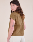 Angled back view of Pantry Button-Up in Desert Brown on Alex