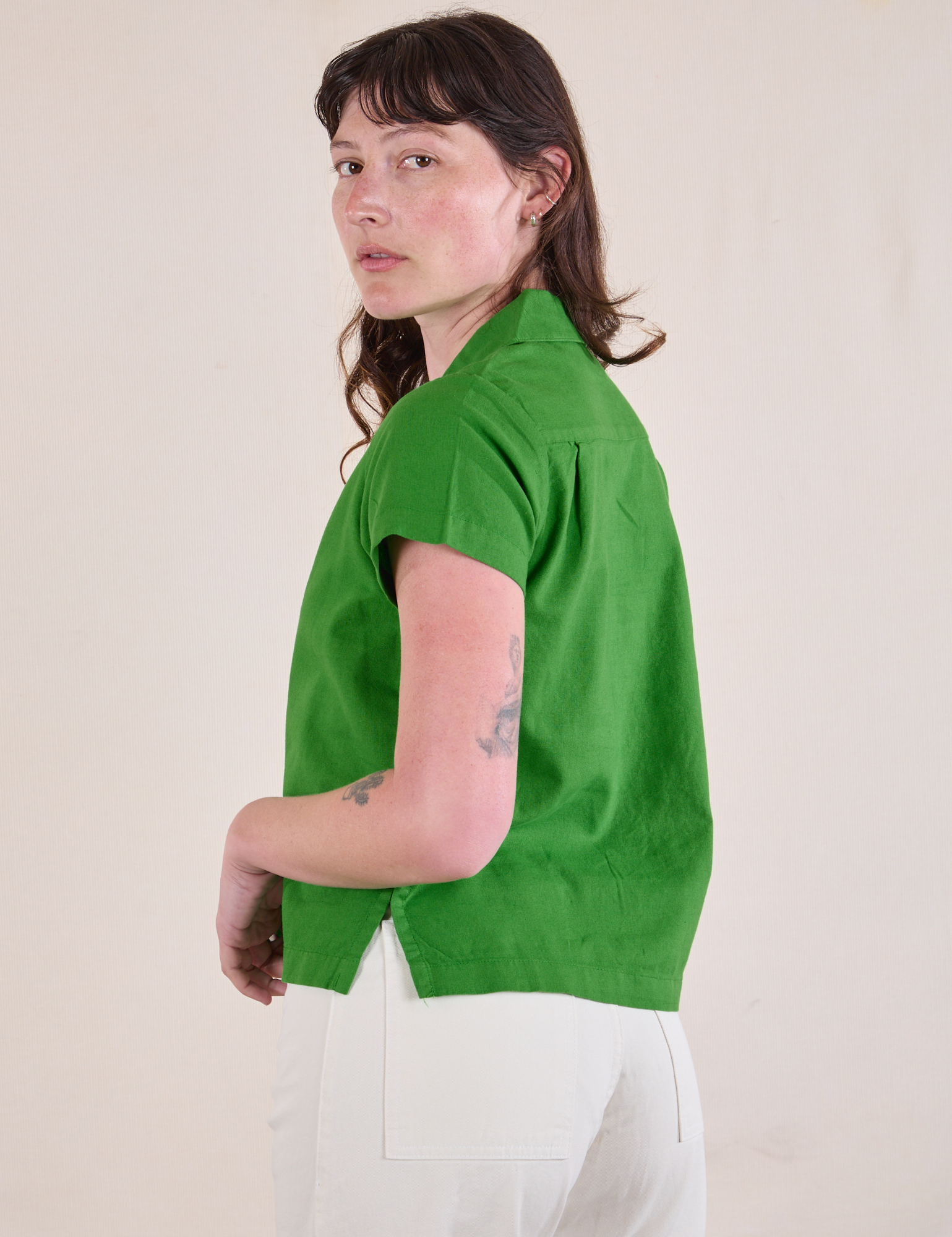 Pantry Button-Up in Kelly Green angled back view on Alex