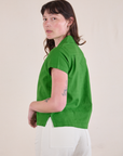 Pantry Button-Up in Kelly Green angled back view on Alex