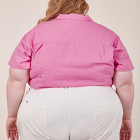 Back view of Pantry Button-Up in Bubblegum Pink worn by Catie