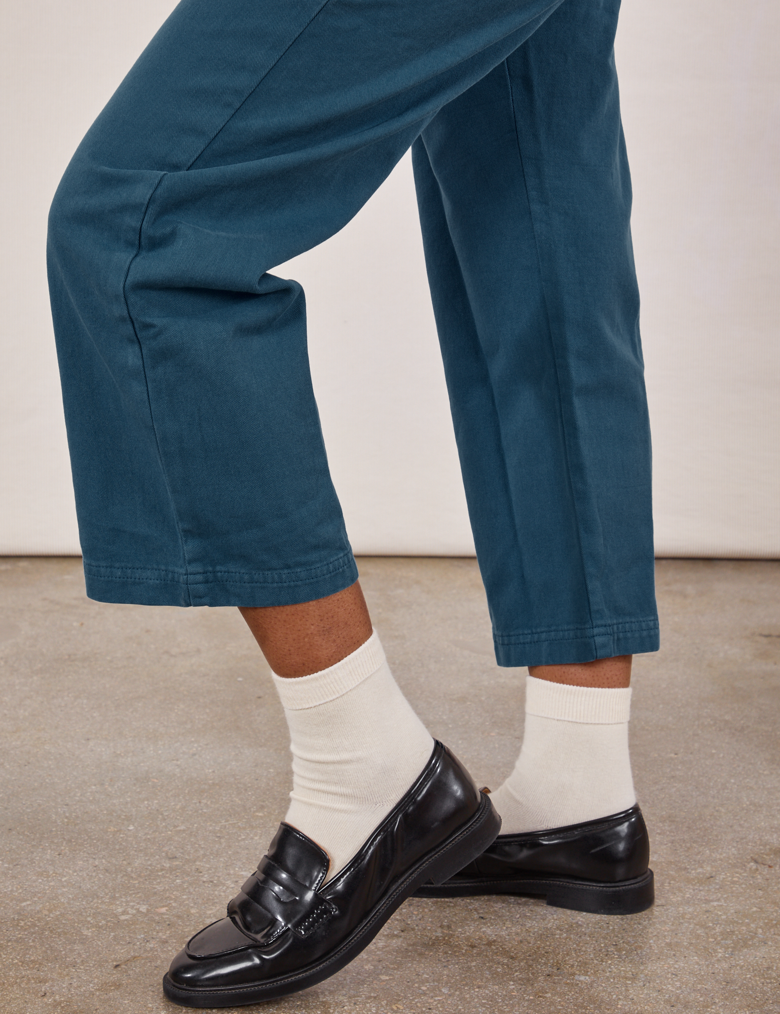 Petite Short Sleeve Jumpsuit in Lagoon pant side view close up on Kandia