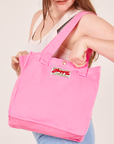 Shopper Tote Bag in Bubblegum Pink worn as a shoulder bag on Allison
