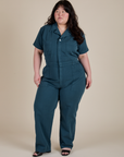 Ashley is 5'7" and wearing 1XL Short Sleeve Jumpsuit in Lagoon