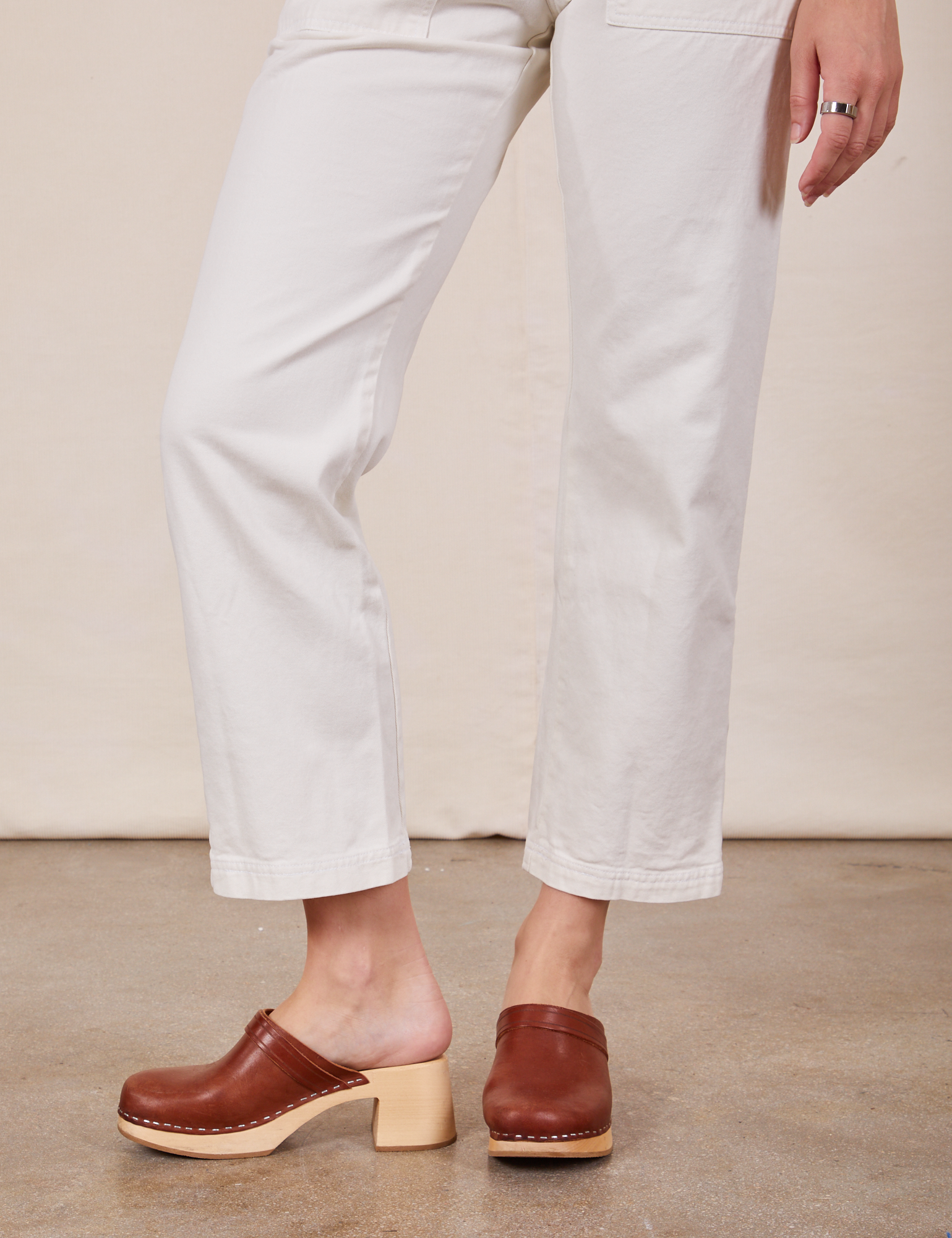 Pant leg close up of Short Sleeve Jumpsuit in Vintage Tee Off-White worn by Alex