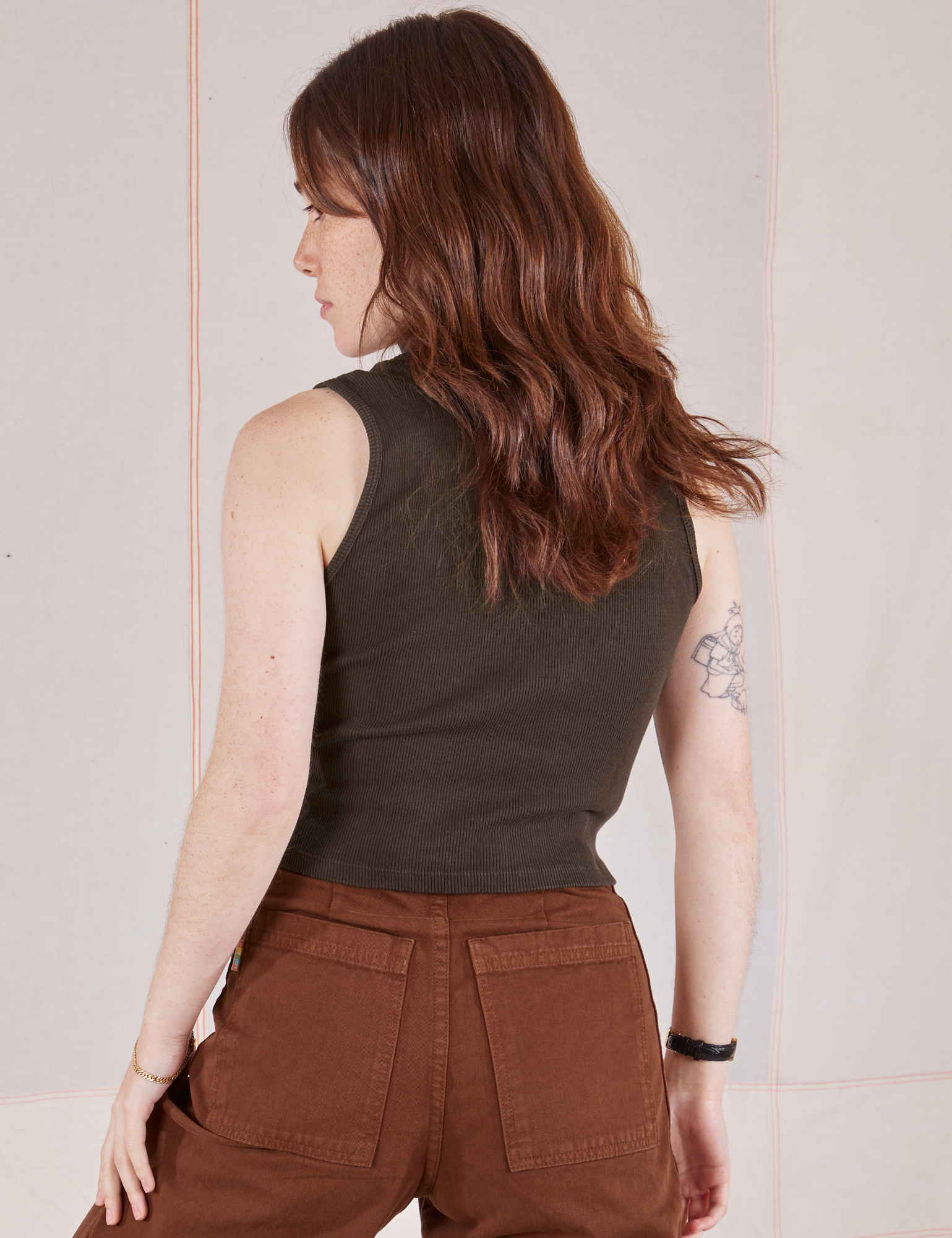 Back view of Sleeveless Essential Turtleneck in Espresso Brown on Hana