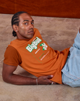 Vintage Tee in Orange Soda worn by Jerrod