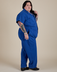 Side view of Short Sleeve Jumpsuit in Royal Blue on Sam