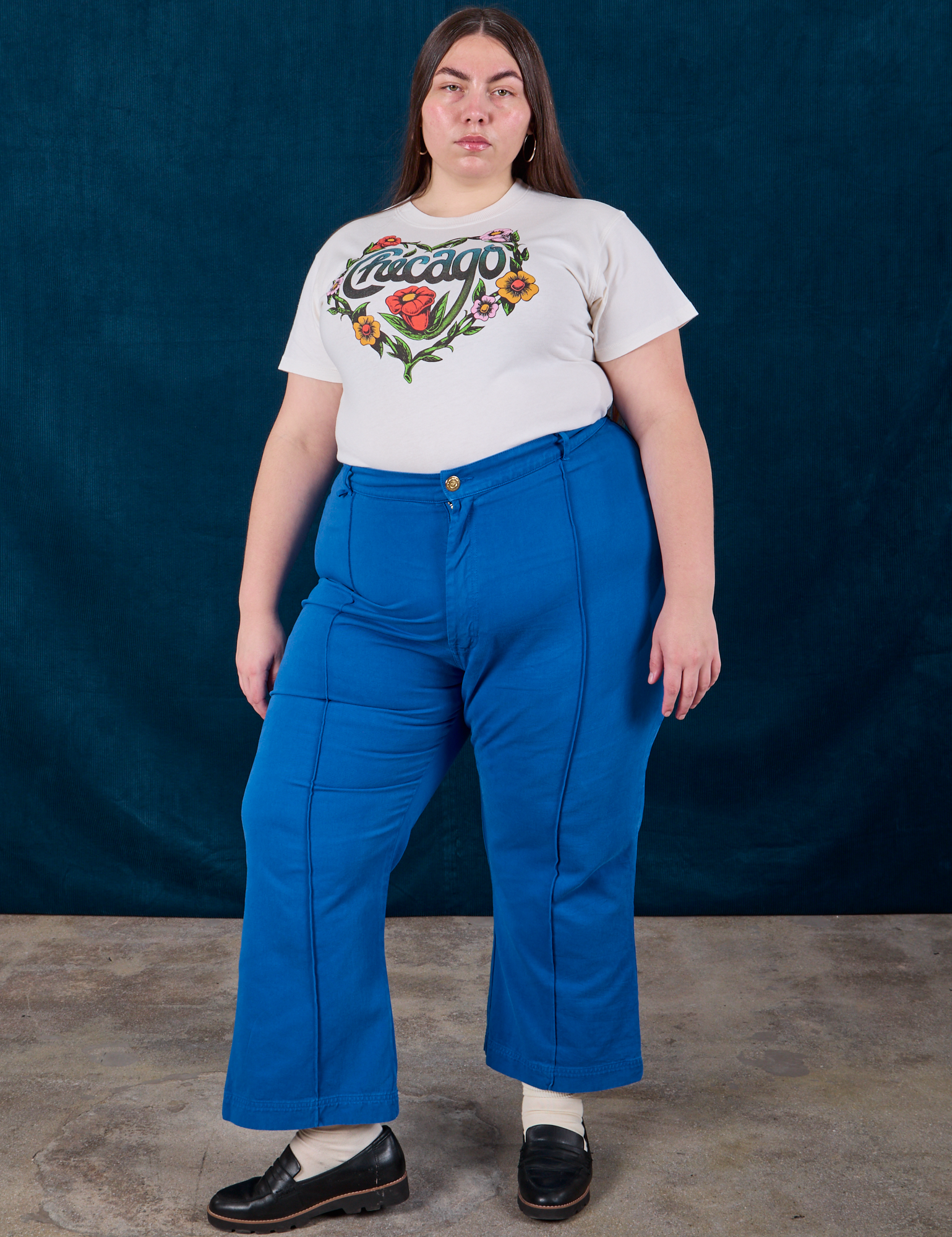 Chicago Tourist Tee and royal blue Western Pants worn by Marielena