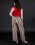 Striped Drop Pocket Pants in Retro Rainbow back view on Alex