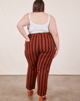 Back view of Black Striped Work Pants in Paprika and vintage off-white Cropped Cami on Marielena