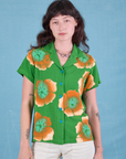 Alex is 5'8" and wearing P Paintstamped Pantry Button-Up in Kelly Green