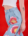 Wide Leg Denim Trousers in Painted Flowers side close up on Alex