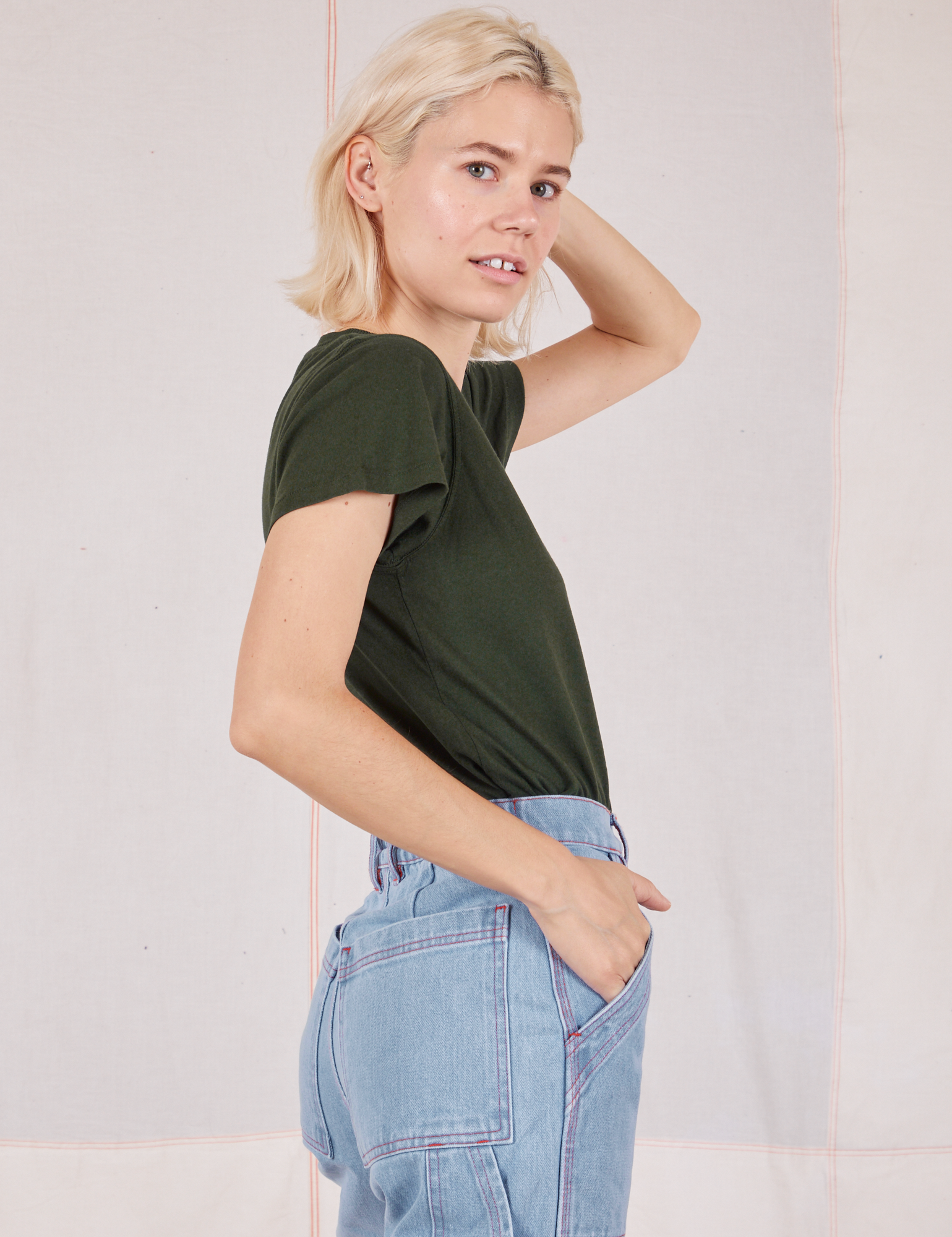 Organic Vintage Tee in Swamp Green side view on Madeline