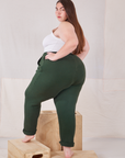 Rolled Cuff Sweat Pants in Swamp Green angled back view on Marielena
