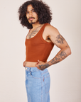 Side view of Cropped Tank Top in Burnt Terracotta worn by Jesse