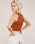 Angled back view of Tank Top in Burnt Terracotta on Madeline