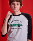 Quinn is 6'3" and wearing M Taxi Raglan Tee in Los Angeles