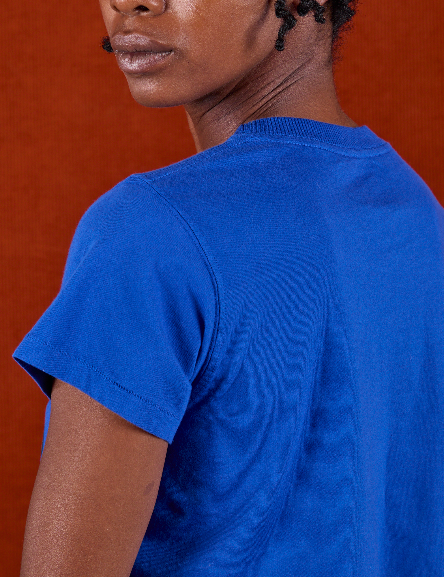 Angled shoulder close up of BBP Tiger Tee on Cheyann
