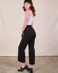 Angled back view of Western Pants in Basic Black on Alex
