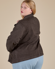 Angled back view of Denim Work Jacket in Espresso Brown on Juliet
