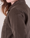 Denim Work Jacket in Espresso Brown shoulder close up on Alex