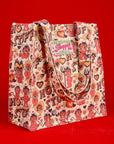 Angled front view of Hot Stuff Printed Shopper Tote