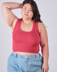 Ashley is 5'7" and wearing L Cropped Tank Top in Hot Pink