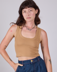 Alex is 5'8" and wearing P Cropped Tank Top in Tan