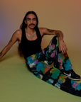 Anthony is wearing Tie Dyed Wide Leg Sweat Pants and black Tank Top