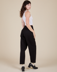 Angled back view of Heavyweight Trousers in Basic Black on Alex