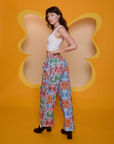 Angled back view of Butterfly Kaleidoscope Drop Pocket Cargo Pants on Alex