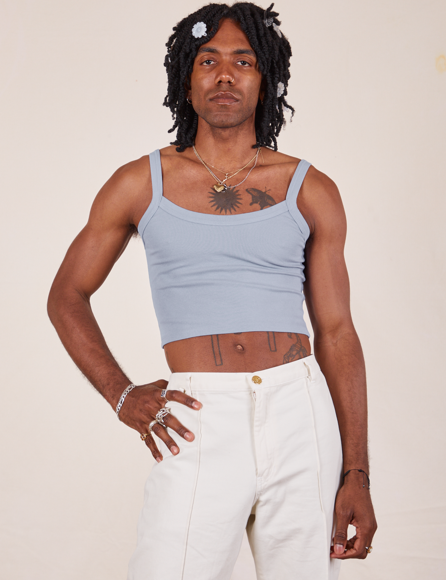 Jerrod is 6&#39;3&quot; and wearing S Cropped Cami in Periwinkle paired with vintage tee off-white Western pants