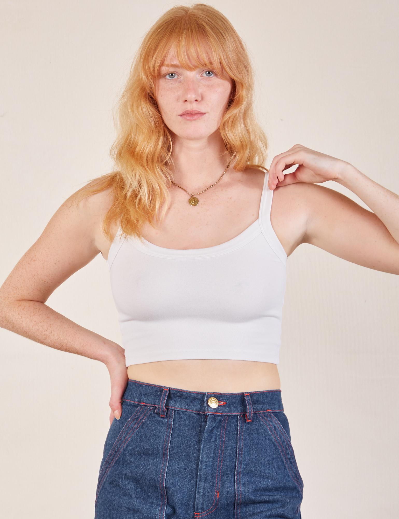 Margaret is 5’11” and wearing P Cropped Cami in Vintage Tee Off-White