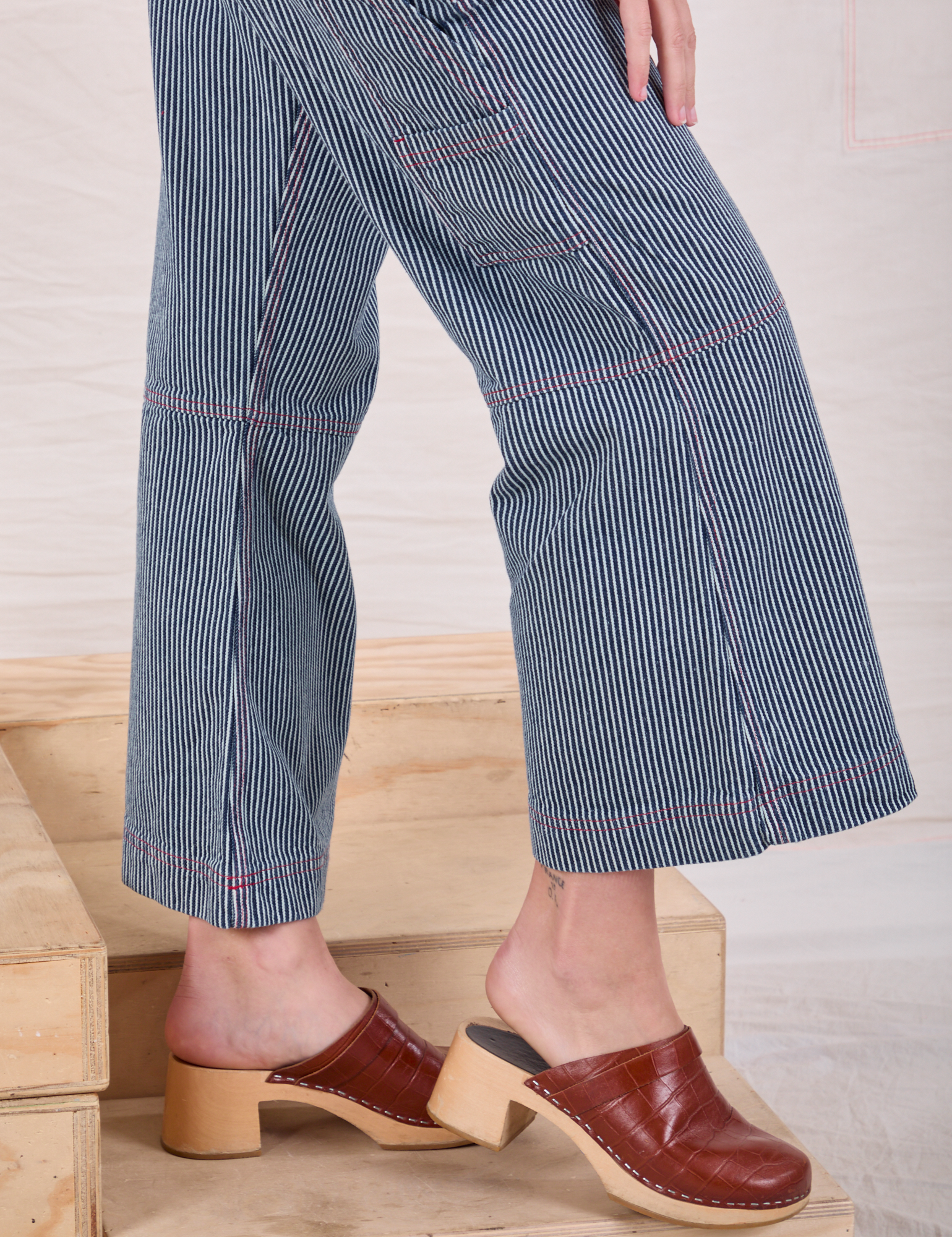 Carpenter Overalls in Railroad pant leg close up on Alex