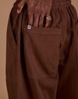 Drop Pocket Cargo Pants in Fudgesicle Brown back pocket close up