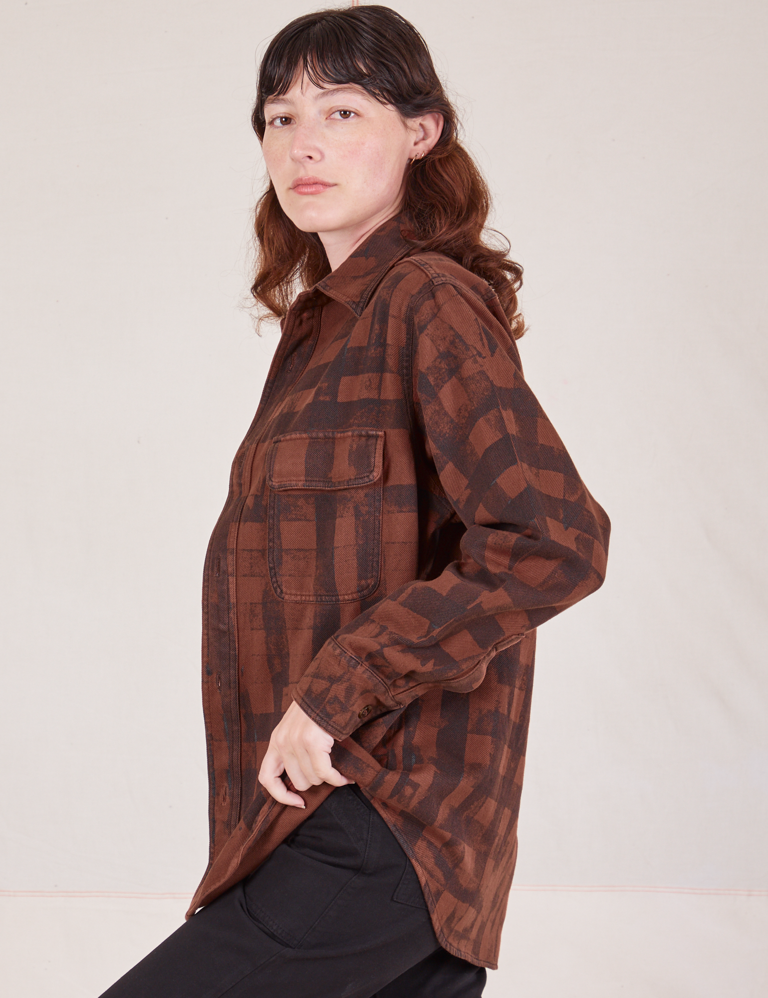 Plaid Flannel Overshirt in Fudgesicle Brown side view on Alex