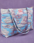 Angled view of Cloud Kingdom XL Zip Tote