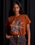 Kandia is 5'3" and wearing XXS Vintage Tee in Spidey