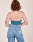 Back view of Halter Top in Marine Blue and light wash Frontier Jeans worn by Alex