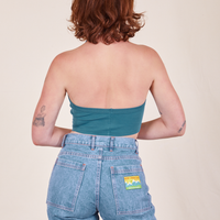 Back view of Halter Top in Marine Blue and light wash Frontier Jeans worn by Alex