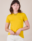 Alex is 5'8" and wearing P JV Tee in Golden Yellow