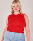 Lish is 5’8” and wearing L Muscle Tee in Mustang Red