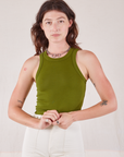 Alex is 5’8” and wearing P Racerback Tank in Summer Olive