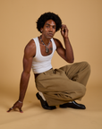 Baggy Mid-Rise Trousers in Desert Brown and vintage tee white Cropped Tank on Jerrod